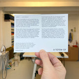 A TOTEM OF convenience drawstring bags postcard